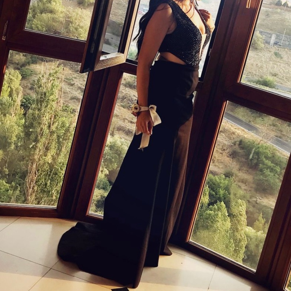 Beautiful black evening gown , stretchy material , with rhinestones. Prom dress